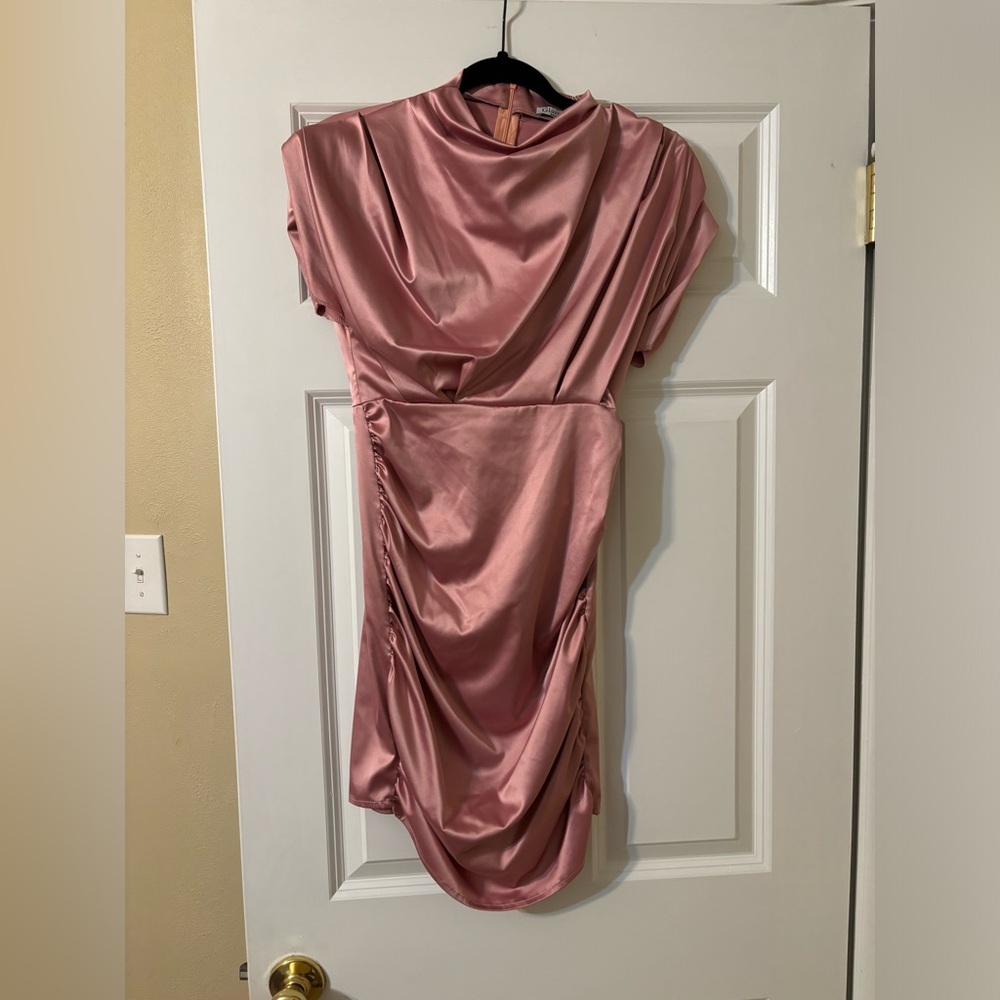 Second owner. Satin blush color dress. Very flattering. Great condition
